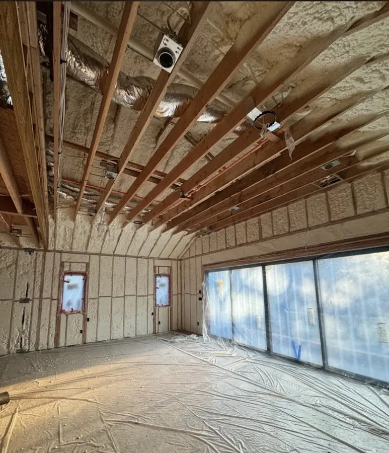 Interior walls and ceiling insulated with spray foam during new construction in Fountain Valley